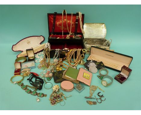 A large collection of costume jewellery to include faux Lotus pearls, diamante, marcasite, enamel flower brooch, compacts etc