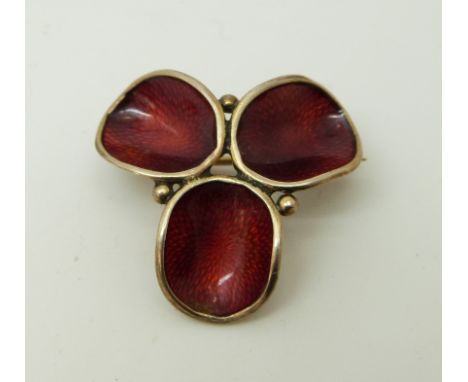 A silver brooch set with red enamel marked 925 Norway, 3 x 3cm