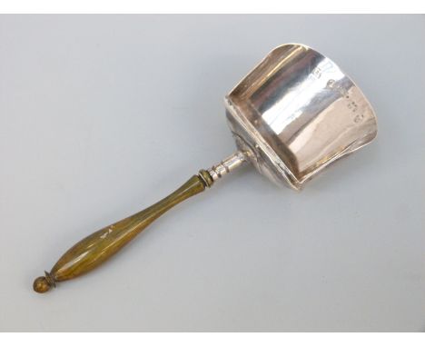 A George III hallmarked silver tea caddy spoon of scoop form with turned stained handle, Birmingham 1811 maker Cox & Betterid