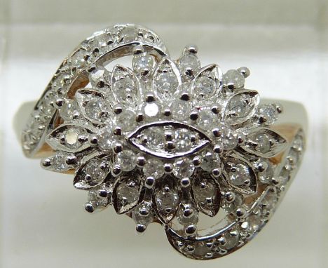 A 9ct gold ring set diamonds in a large cluster, total diamond weight approximately 0.5ct, 3.36g (size N) 