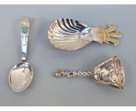 A modern feature hallmarked silver caddy spoon with Prince of Wales feathers finial, Berthold Muller Dutch caddy spoon and an