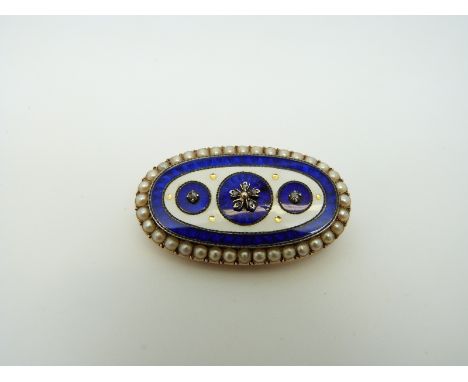 An early Victorian oval brooch, the central circular panels of blue guilloché enamel set with diamonds in a flower design, su