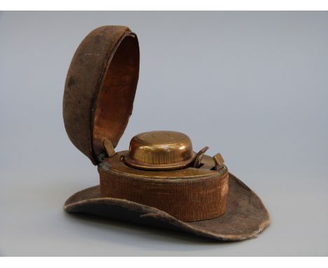 A novelty inkwell in the form of a Stetson/cowboy hat, length 9cm 