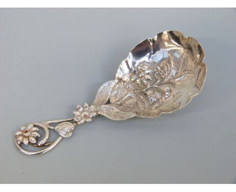A Victorian hallmarked silver tea caddy spoon with pierced and repoussé floral decoration, Birmingham 1866 maker Hamilton & I