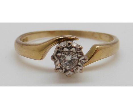 An 18ct gold ring set with a diamond, 3.1g (size P) 
