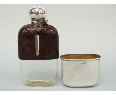 A Victorian hallmarked silver hip flask, part crocodile skin covered, with bayonet cap and pull off cup, Sheffield 1898 maker