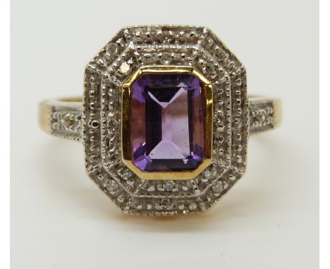 A 9ct gold ring set with an amethyst and diamonds (size M) 