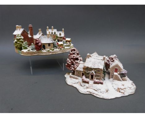 Two large Lilliput Lane cottages "First Snow at Bluebell" edition 2048 and an illuminated "Christmas Fayre", both boxed