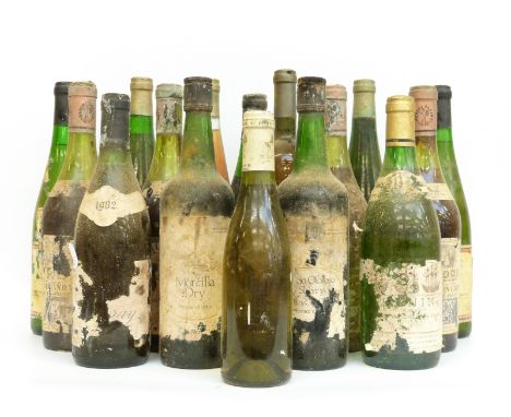 Sixteen bottles of vintage wines, some with missing labels, includes several bottles of Grand Vin Henri Maire, Oloroso sherry