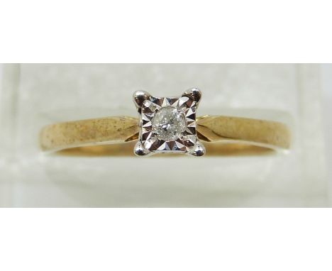 A 9ct gold ring set with a diamond in a square setting, 2.13g (size P)