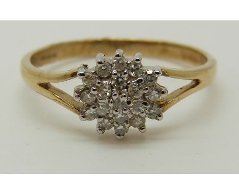 A 9ct gold ring set with diamonds in a cluster, total diamond weight approximately 0.25ct, 1.89g (size P) 