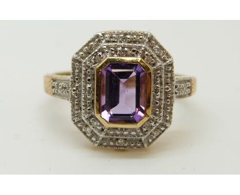 A 9ct gold ring set with an amethyst and diamonds (size M) 