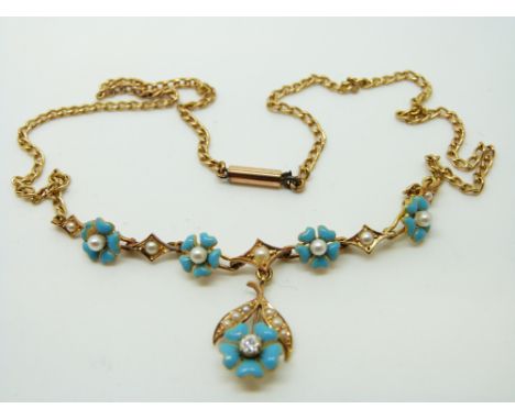 An Edwardian 18ct gold necklace set with seed pearls, blue enamel flowers and an old cut diamond, 9.3g