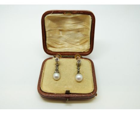 A pair of Victorian earrings each set with a drop pearl and a diamond, in original box, 2.5cm drop