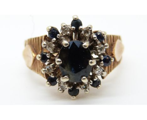 A 9ct gold ring set with sapphires and diamonds (size K) 