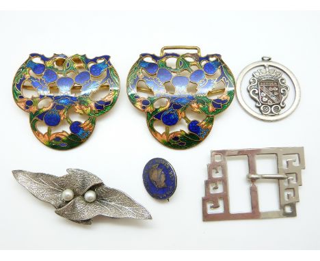 An Art Nouveau buckle set with enamel, a buckle with Greek key decoration etc