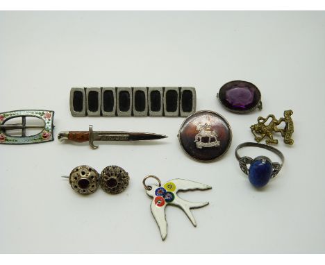 A Charles Horner silver brooch in the form of a buckle set with enamel, another silver brooch set with an amethyst, early sil