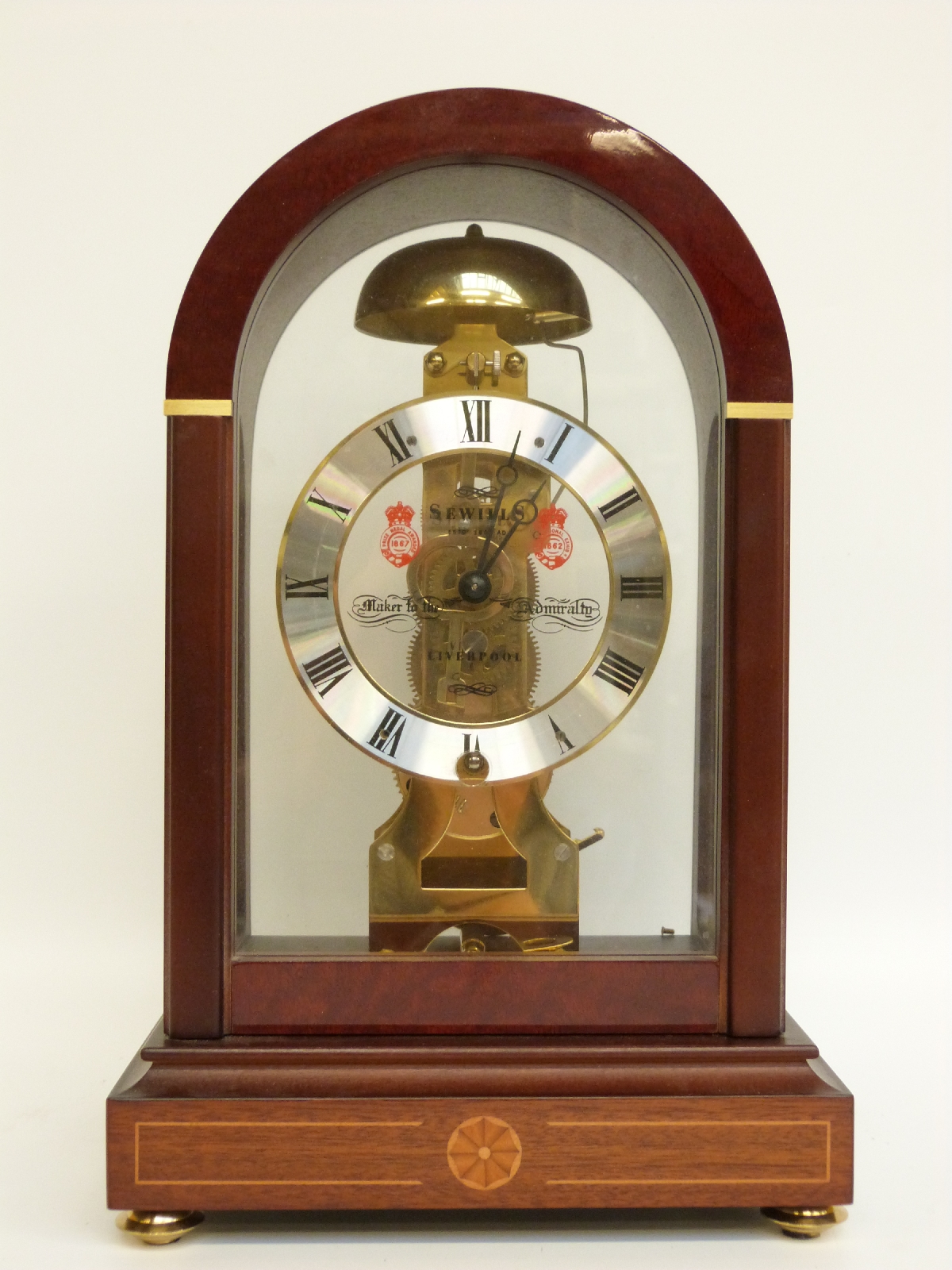 A Sewills four glass mahogany skeleton mantel clock, 30cm tall
