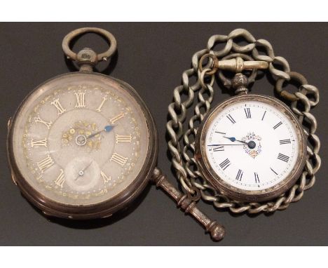 Two hallmarked silver pocket watches one with engine turned silvered face, gilt detail and Roman numerals the other with whit
