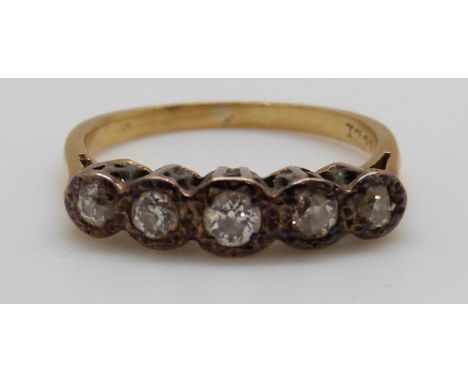 An 18ct white gold ring set with five diamonds, 3g (size N)
