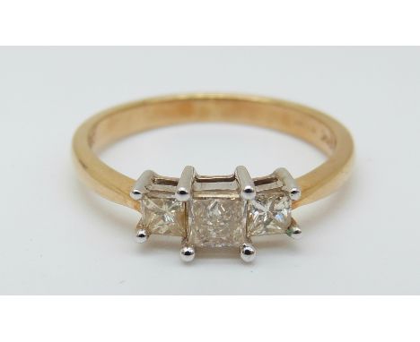 An 18ct gold ring set with three princess cut diamonds, total diamond weight approximately 0.5ct, 3g (size N)
