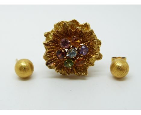 An 18ct gold earring in the form of a flower set with amethyst, citrine, garnet and blue topaz together with a pair of 18ct g