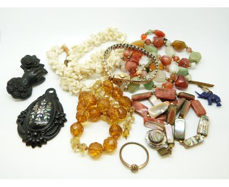 A Victorian jet brooch in the form of a hand and a rose, a Victorian jet pendant, yellow metal watch, agate necklace etc 
