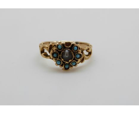 A Victorian ring set with a seed pearl surrounded by turquoise, 1.6g, size D/E 