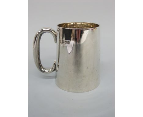 An Edward VII hallmarked silver tankard of plain tapering form, London 1908 maker William Hutton & Sons Ltd, height 9cm, weig