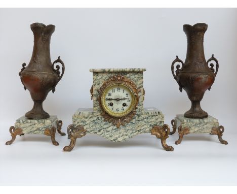 A marble clock garniture with ormolu mounts, the Arabic ivory coloured dial with gilt surround and beetle style hands, the tw