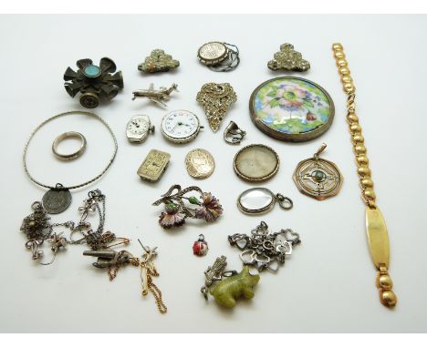 A collection of jewellery to include silver charms, silver ring, silver brooch, a seal, three watch movements, Victorian silv