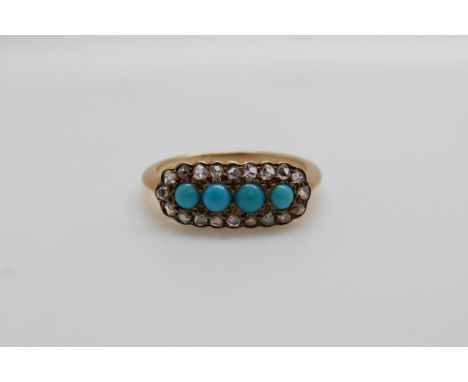 A Victorian ring set with a four turquoise cabochons surrounded by rose cut diamonds (size K)
