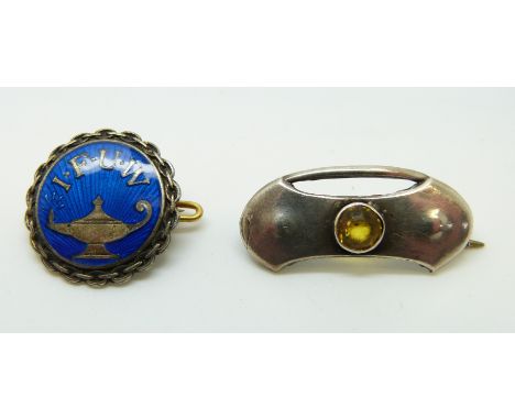 A David Andersen brooch set with blue enamel and I.F.U.W (International Federation of University Women) and a hallmarked silv
