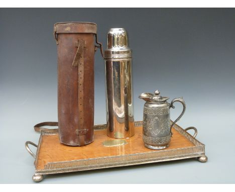 A leather cased Landers Frary & Clark 'Universal' hunting or motoring flask, height 36cm, galleried tray, length 53cm and a p