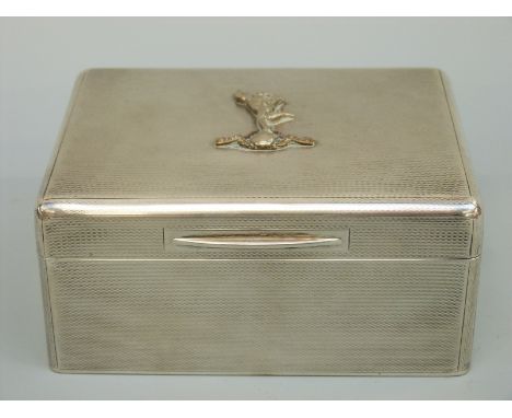 A George V hallmarked silver engine turned Royal Signals interest cigarette box, London 1928 maker Padgett & Braham, width 11