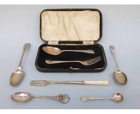 A cased hallmarked silver fork and spoon set and three further hallmarked silver spoons, weight 82g, silver and mother of pea