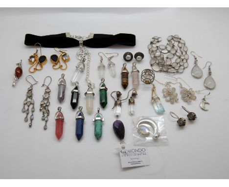 A moonstone necklace, four pairs of moonstone earrings, amber brooch, pearl earrings, a quantity of crystal pendants etc