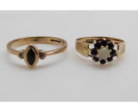 A 9ct gold ring set with a sapphire and two diamonds and a 9ct gold ring set with an opal surrounded by sapphires 