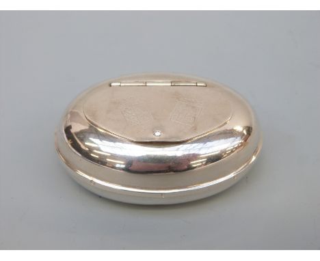 A continental white metal snuff/trinket box with engraved coronets and heraldic shields, marked to underside Ferri 800, width