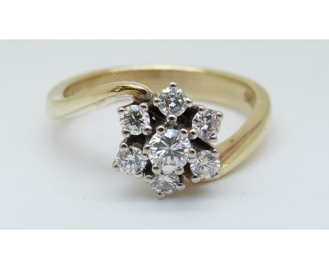 A 14ct gold ring set with diamonds in a cluster, total diamond weight approximately 0.5ct (size O) 