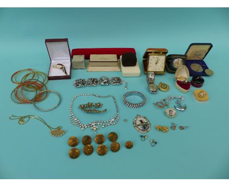 A collection of costume jewellery etc to include diamante military buttons, travelling clock, silver earrings etc