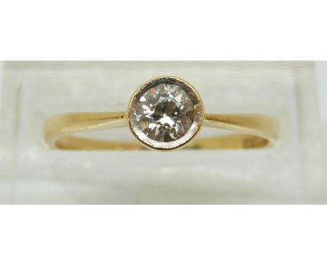 An 18ct gold ring set with a round cut diamond of approximately 0.22ct, 2.32g (size N)