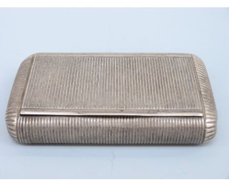 A 19thC French reeded white metal snuff box with French silver marks circa 1819-38, length 8.5cm, weight 73g