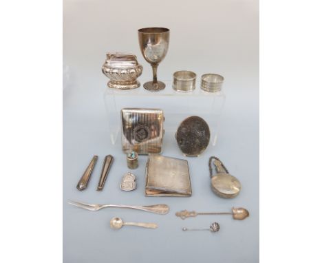 A 19th century hallmarked silver fiddle pattern fork, hallmarked silver cup, cigarette case, two salt spoons, two napkin ring