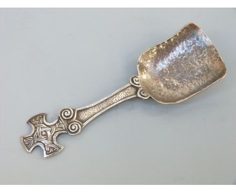 A George VI hallmarked silver caddy spoon with cruciform handle with Celtic knot design, Chester 1938 maker Shipton & Co. Ltd