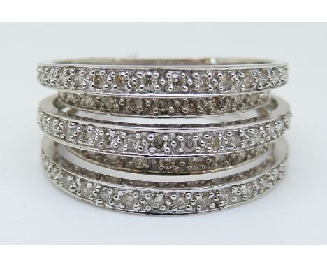 A 9ct white gold ring set with diamonds in layered bands, total diamond weight approximately 1ct, 7.39g (size P) 
