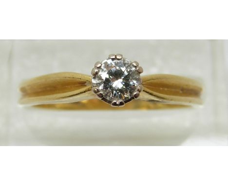 An 18ct gold ring set with a round cut diamond of approximately 0.25ct (size Q)