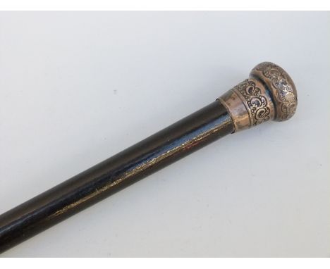 A hallmarked silver topped walking stick 