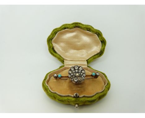 An early Victorian brooch set with rose cut diamonds, two turquoise cabochons and a seed pearl in the form of an scallop shel
