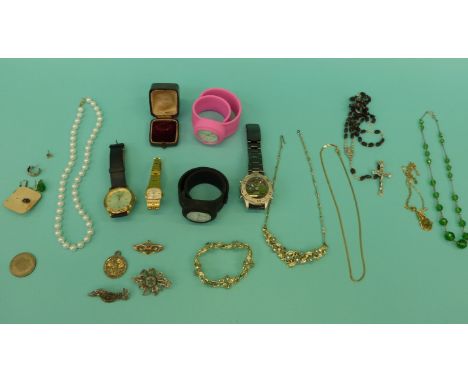 A collection of jewellery to include a 9ct gold brooch, necklaces, watches, vintage Paris ring box etc